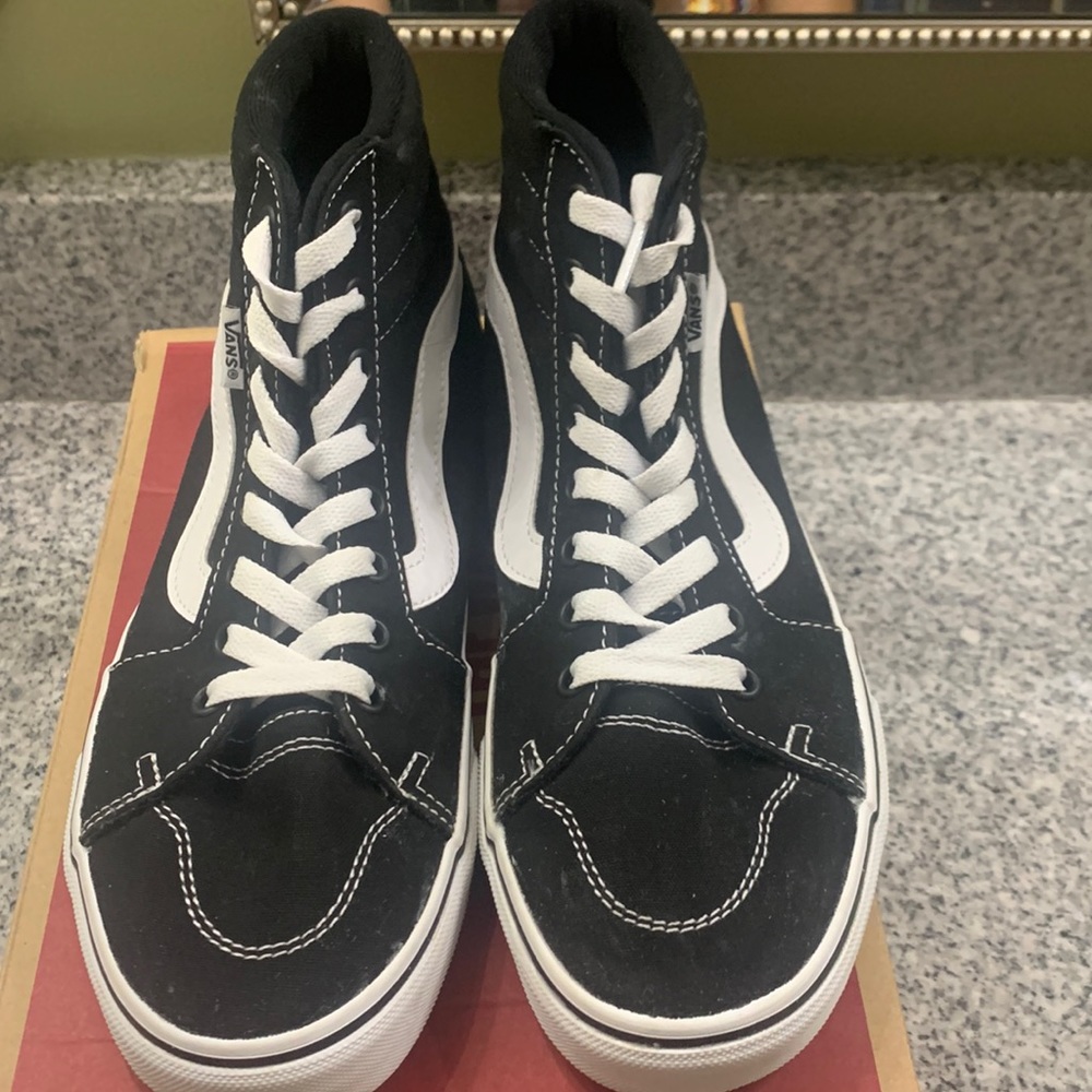 Womens High top black and white vans shoes size 8.5
